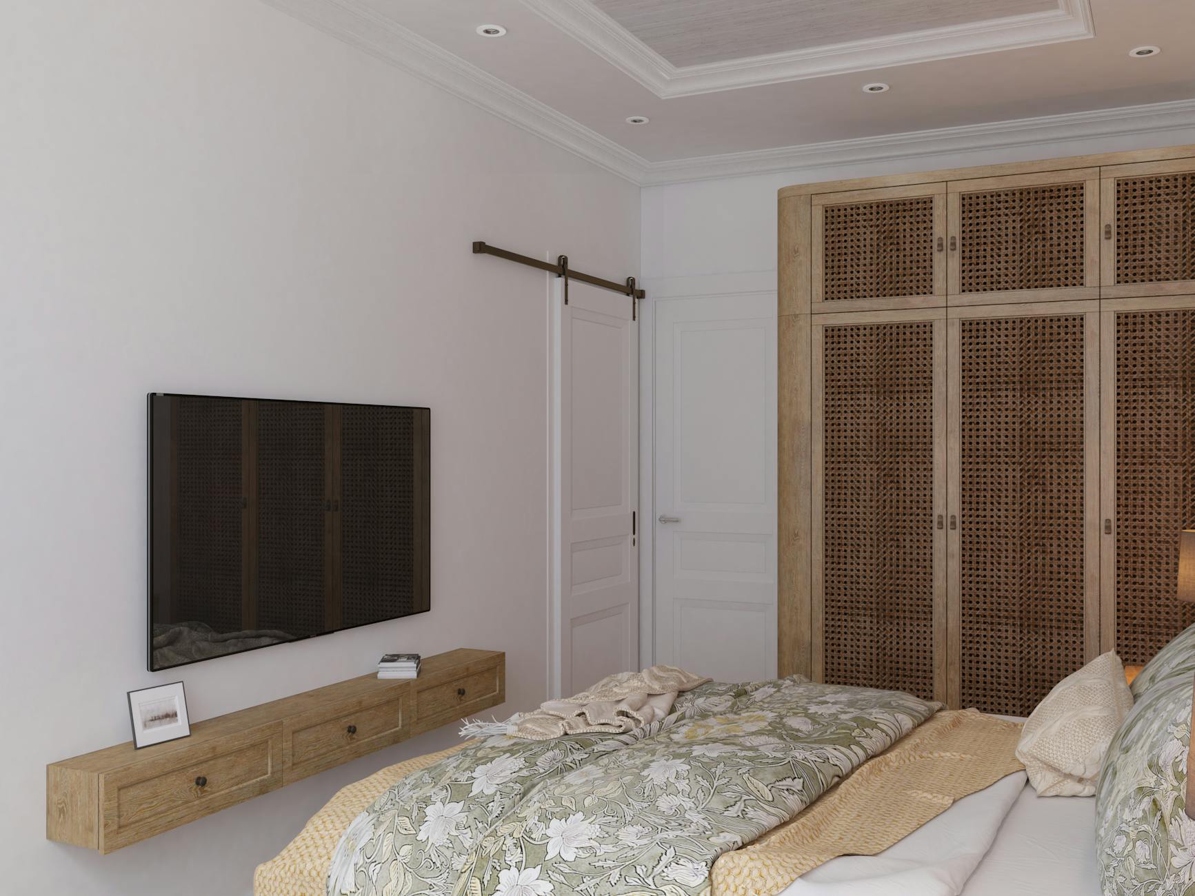Nowoczesna sypialnia z plecioną szafą i telewizorem na ścianie